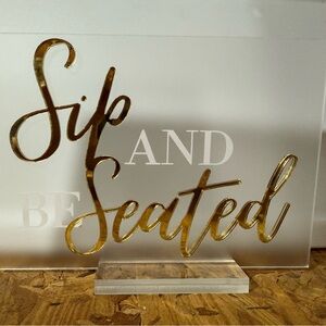 Gold Acrylic Sign 'Sip and Be Seated'